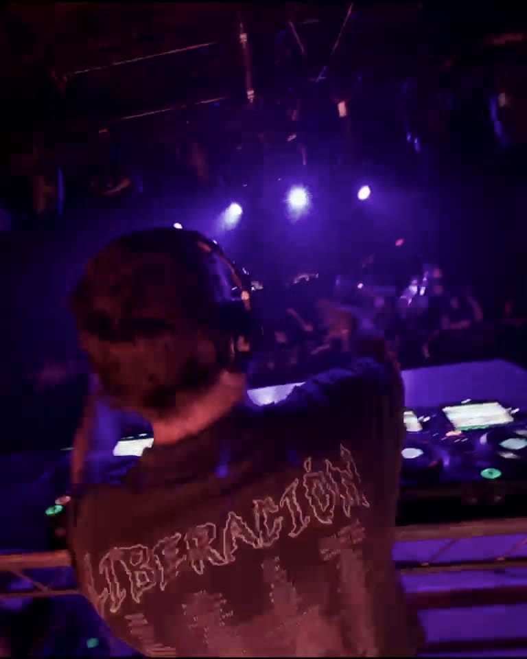 TWONSKi from behind at Factory 1720, purple light over the floor